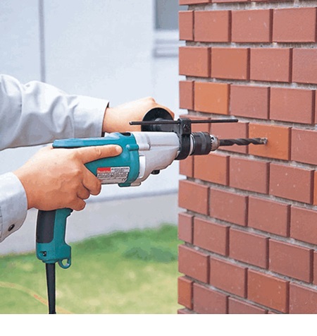 Дрель ударная Makita HP 2051