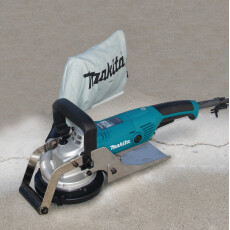 Шлифователь по бетону MAKITA PC 5001 C в чем.