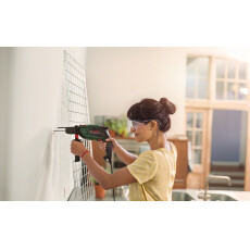 Дрель ударная BOSCH UniversalImpact 700 в чем.