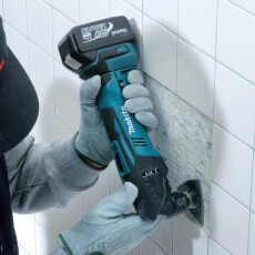 Аккумуляторный многофункциональный инструмент (реноватор) MAKITA TM 30 DZ в кор.