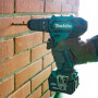 Аккумуляторная ударная дрель-шуруповерт MAKITA HP 333 DWME в чем.