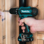 Аккумуляторная  ударная дрель-шуруповерт MAKITA HP 333 DWAE в чем.